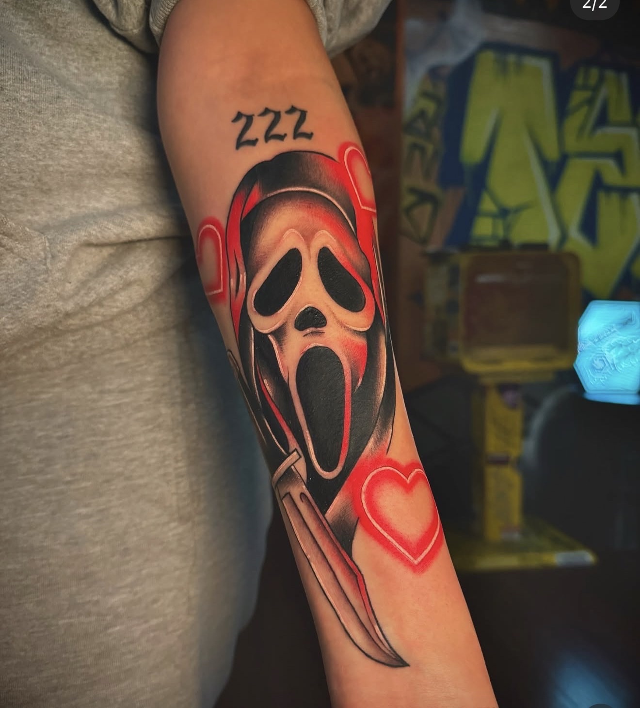 American traditional ghost face with a little new school vibe to it with some glowing hearts.