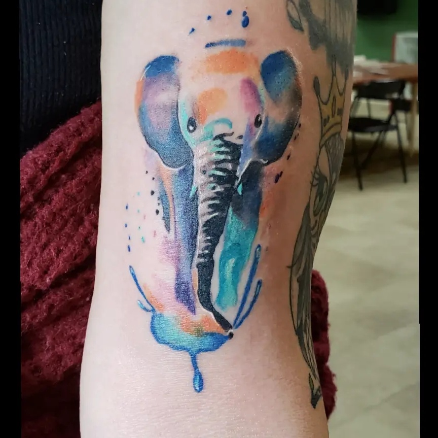Joe Osborne Watercolor tattoo