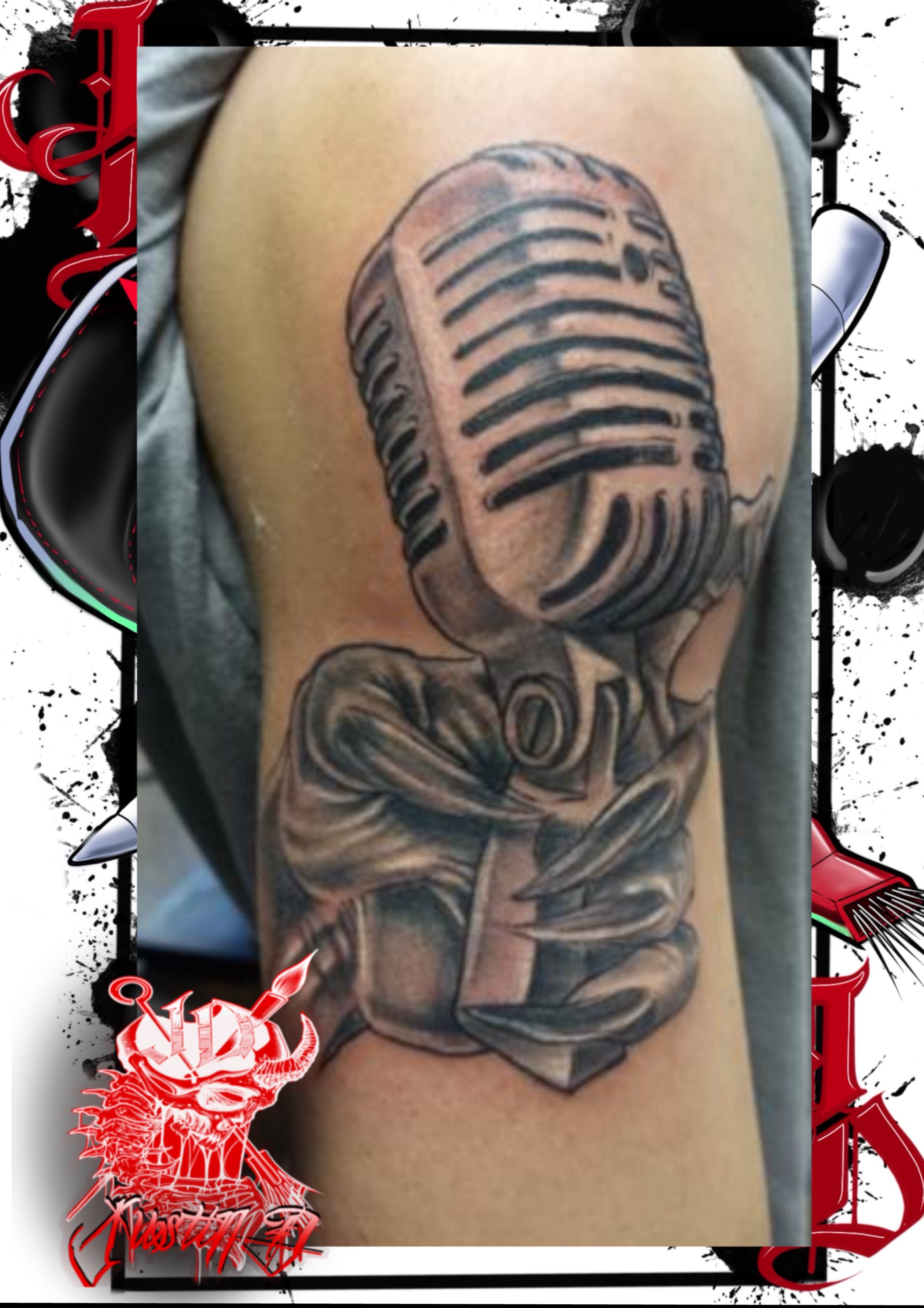 Demonic hand holding a microphone
