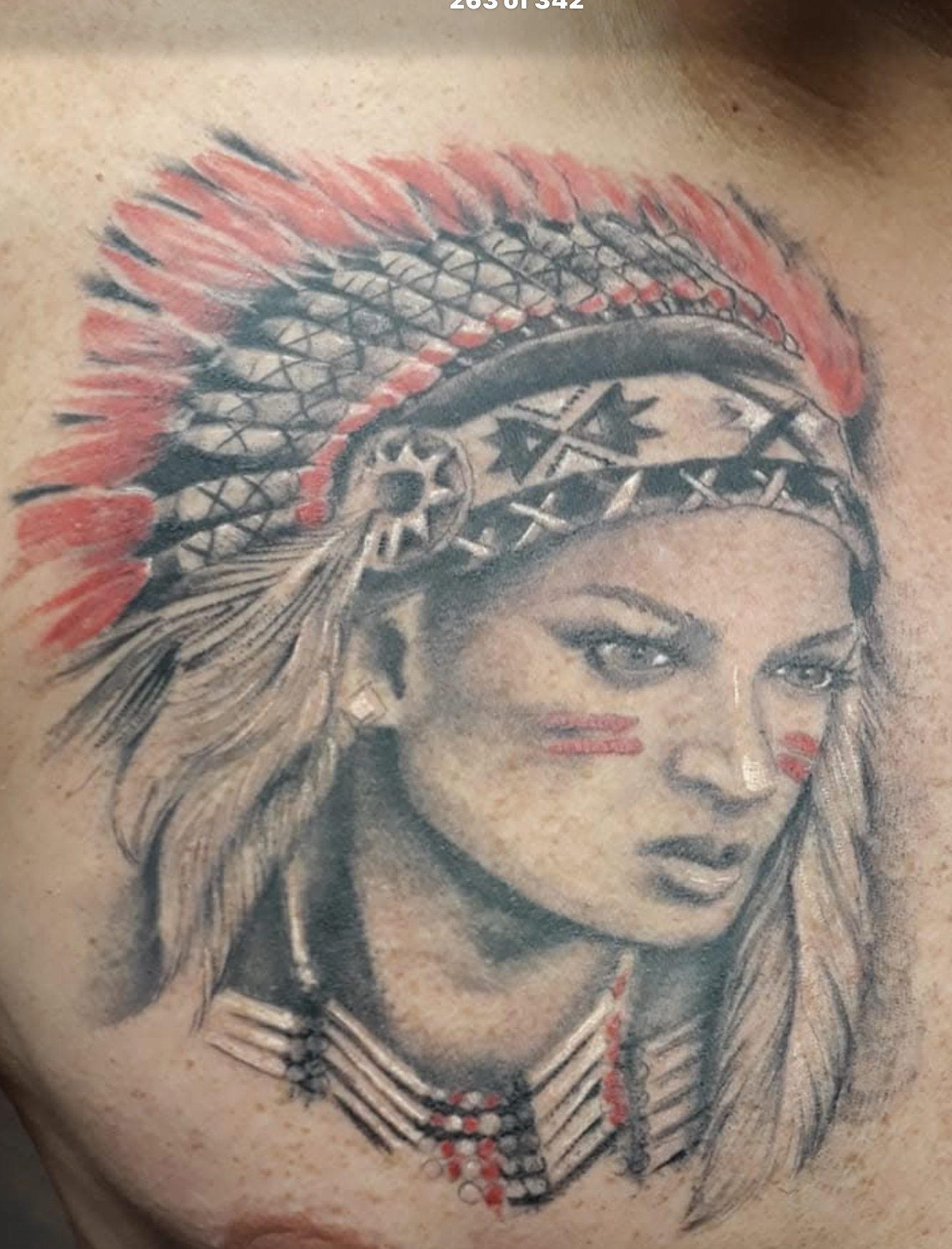 Black and gray Indian girl with head dress