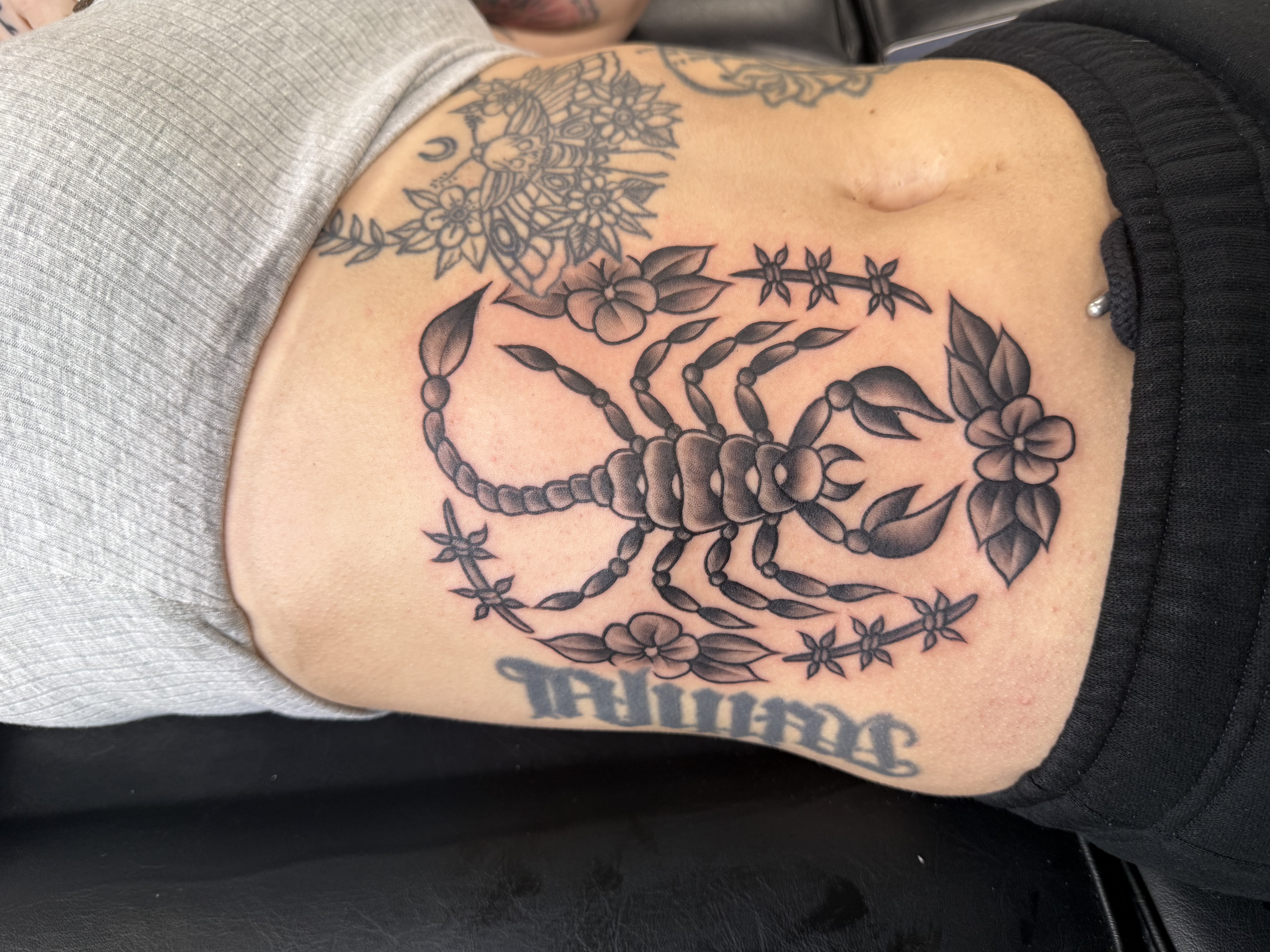 Simple scorpion tattoo