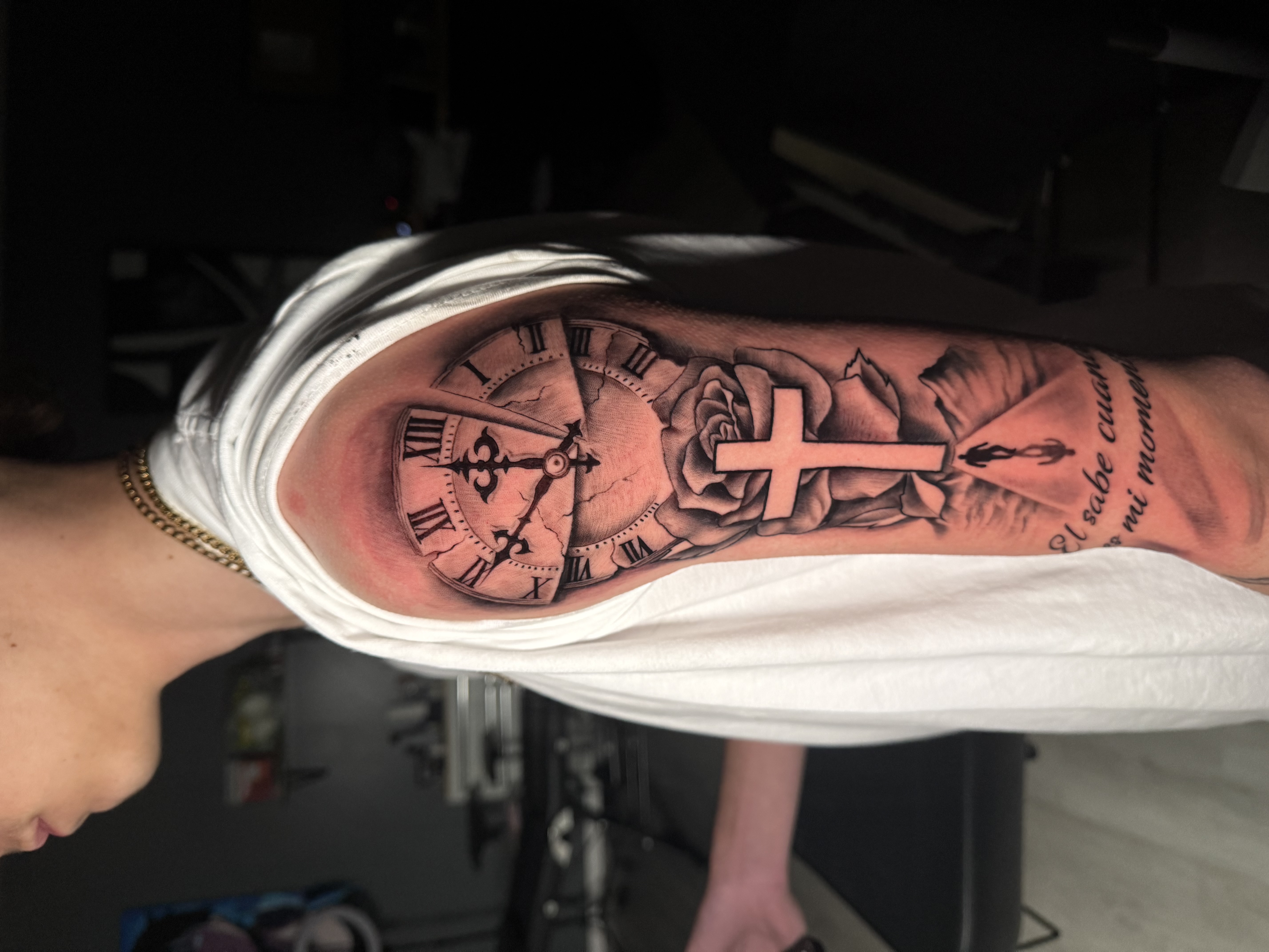 Clock tattoo on arm