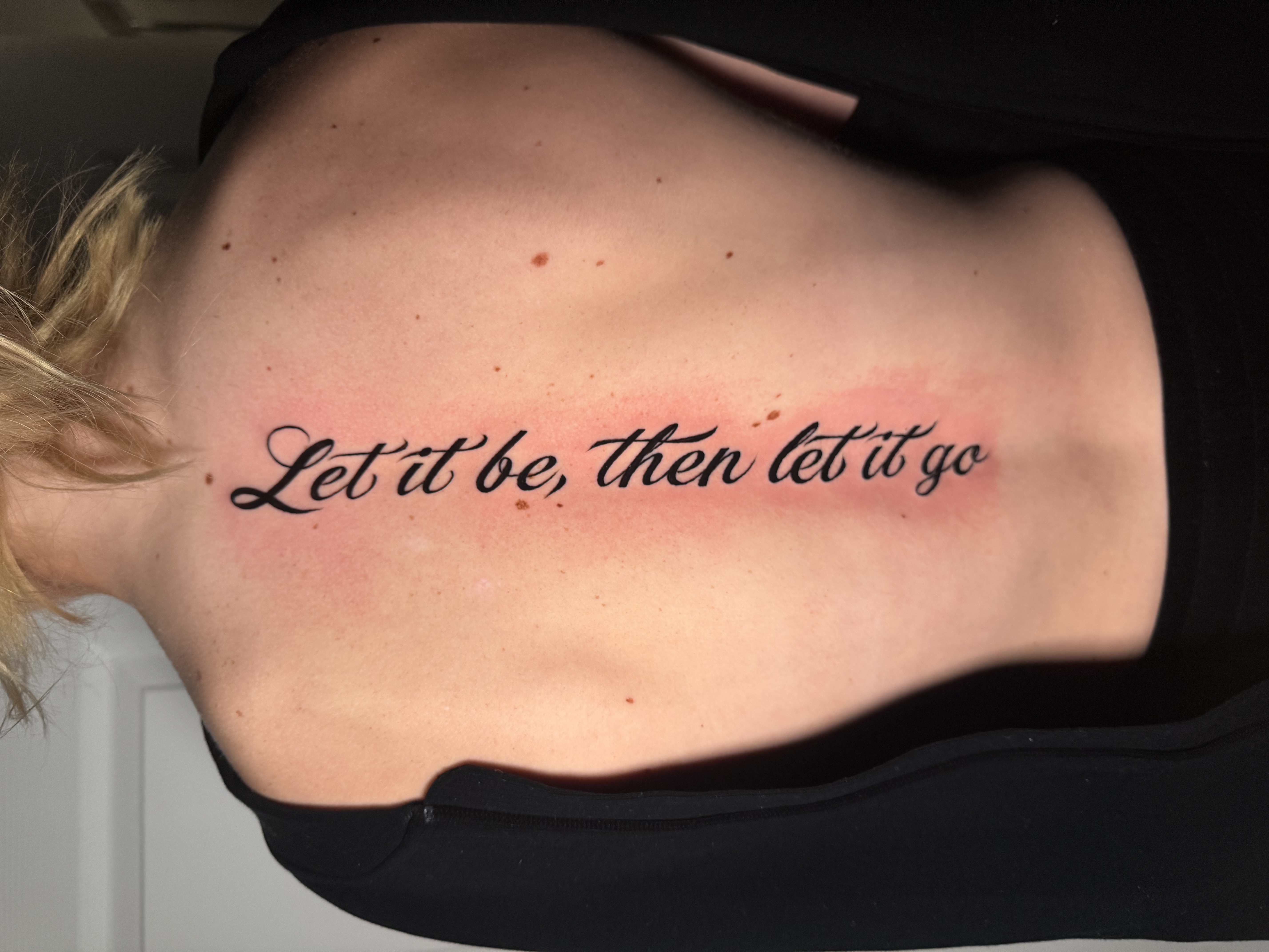 Spine quote tattoo
